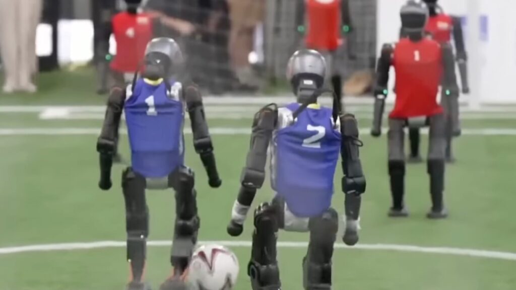 In Beijing, robots play sports and memorable falls In Beijing, robots play sports and memorable falls