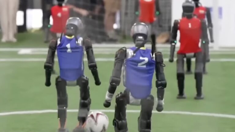 In Beijing, robots play sports and memorable falls