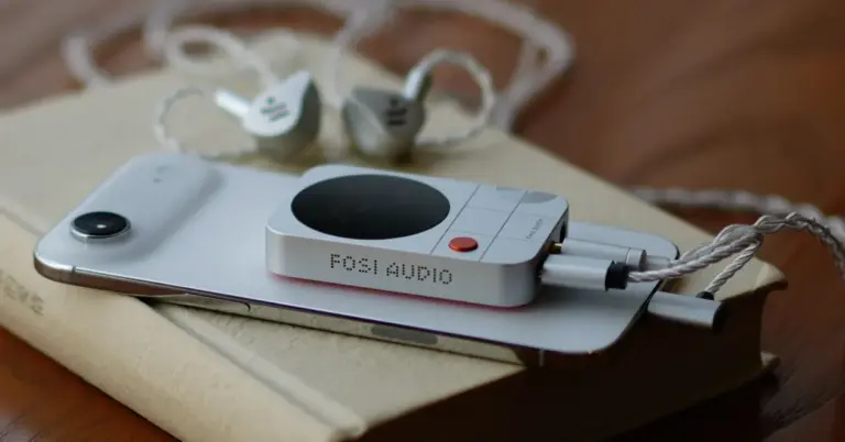 This magnetic headphone amp puts a DAC (and a screen) on the back of your iPhone